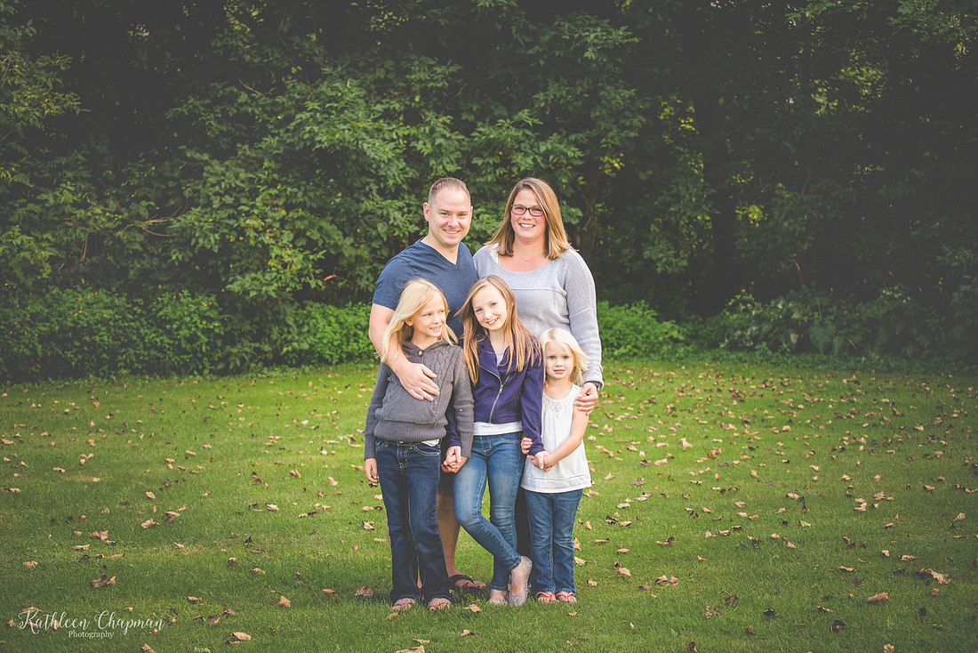 family of five portrait in park potsdam NY family photographer extended family session