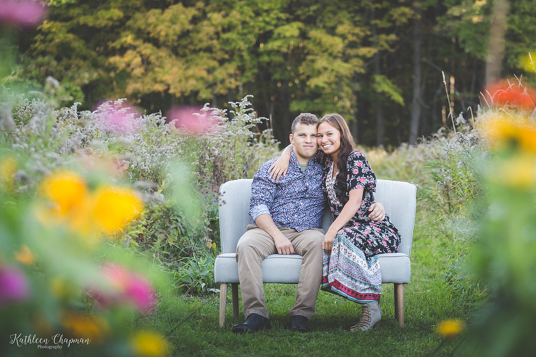 young couple in wild flowers franklin county ny child photographer